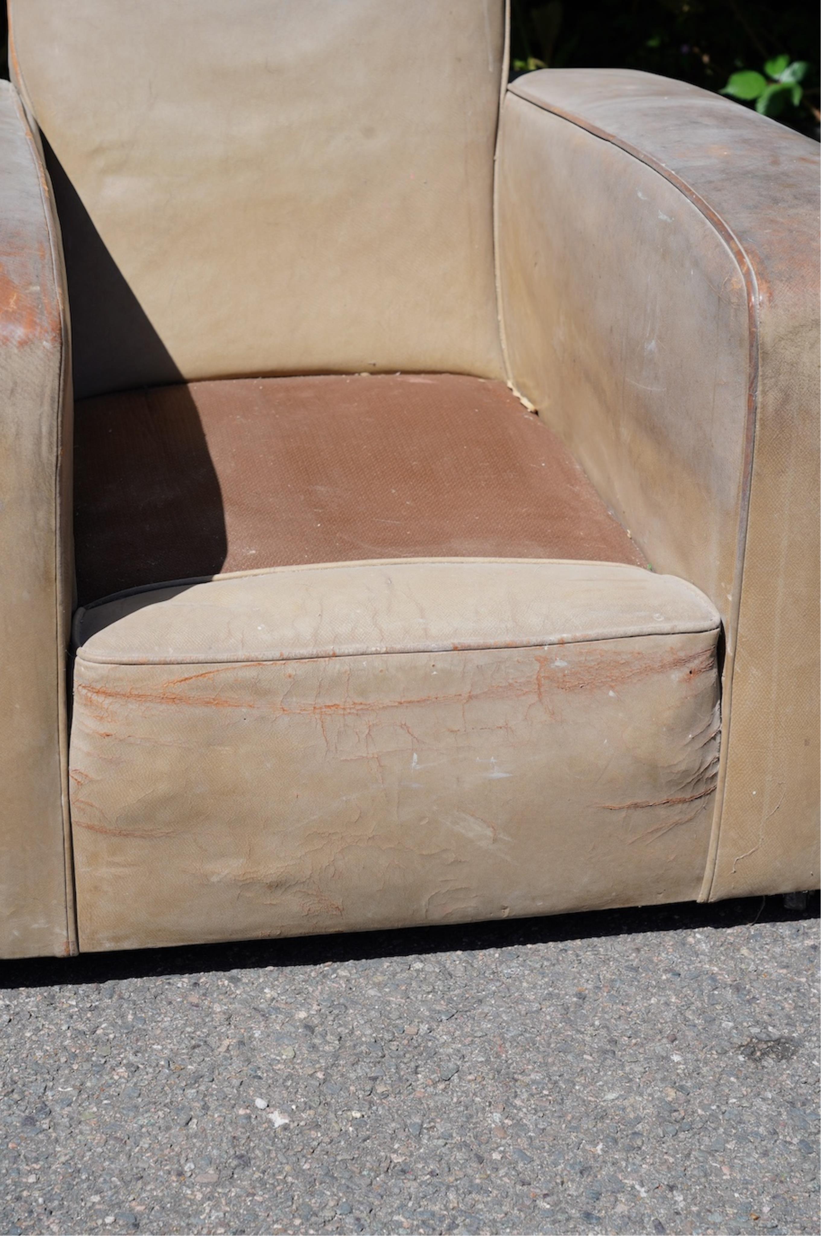 A pair of leather club armchairs, width 85cm, depth 88cm, height 84cm. Condition - poor